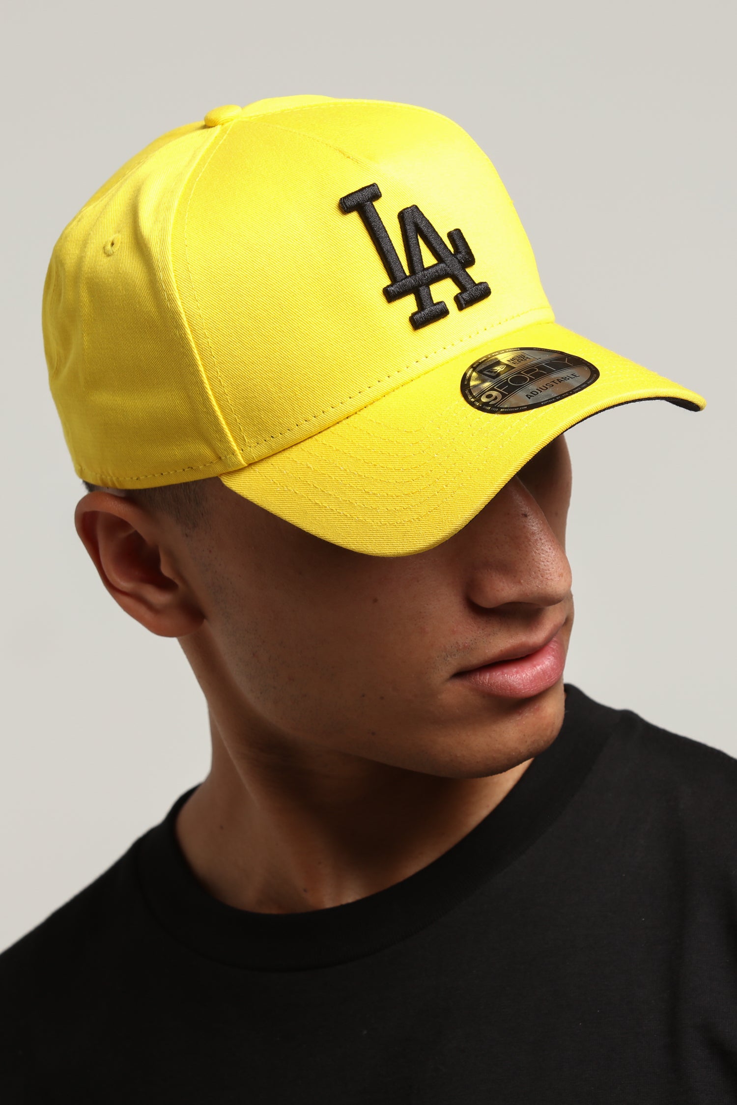 black and yellow dodgers hat