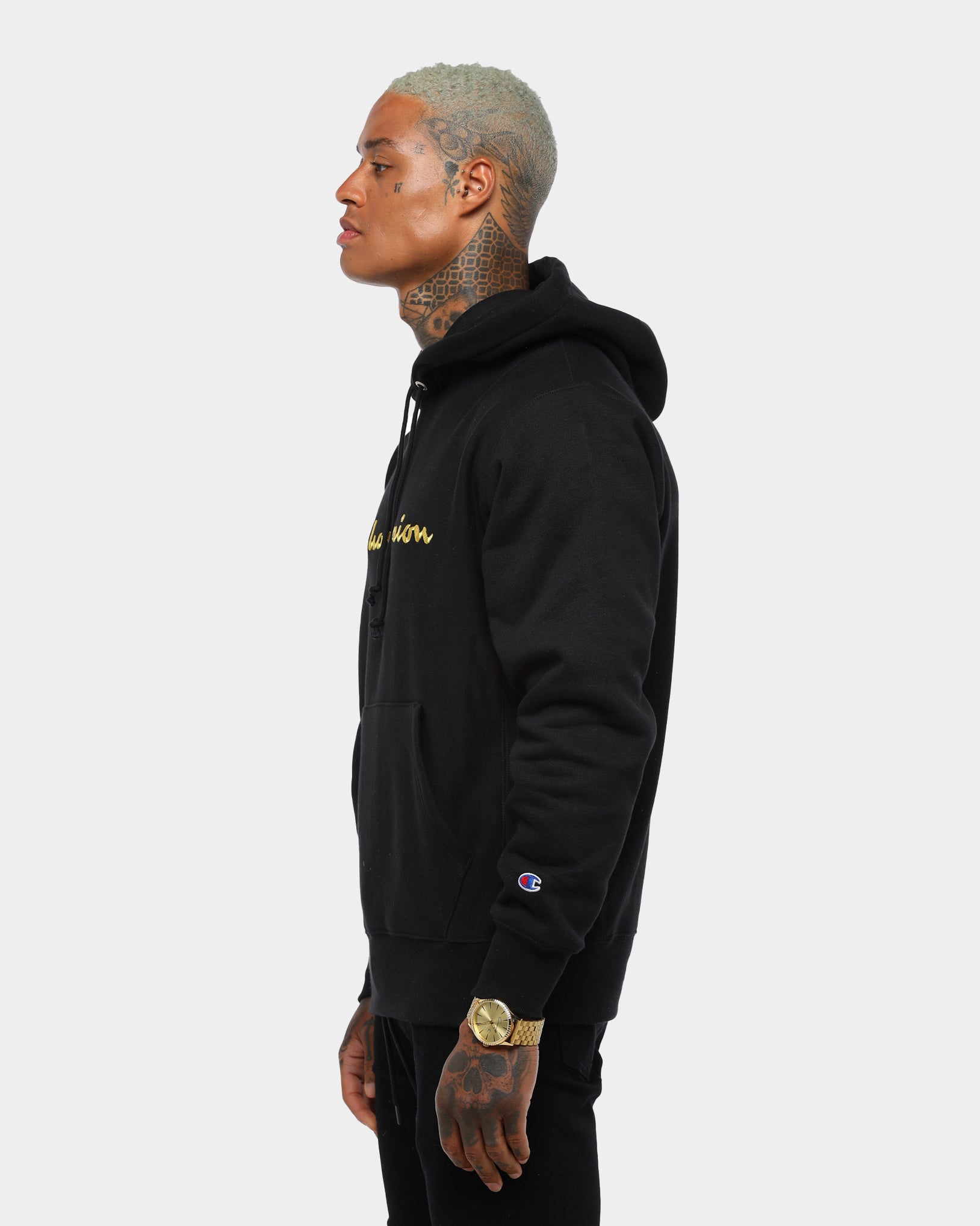 gold and black champion hoodie