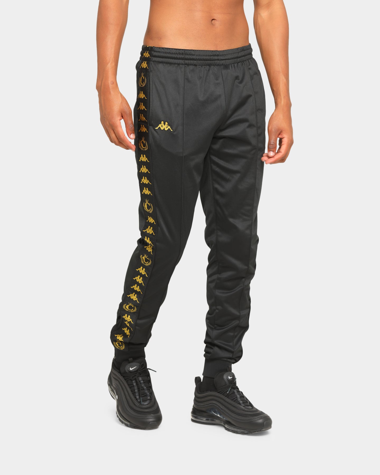 black and yellow kappa pants