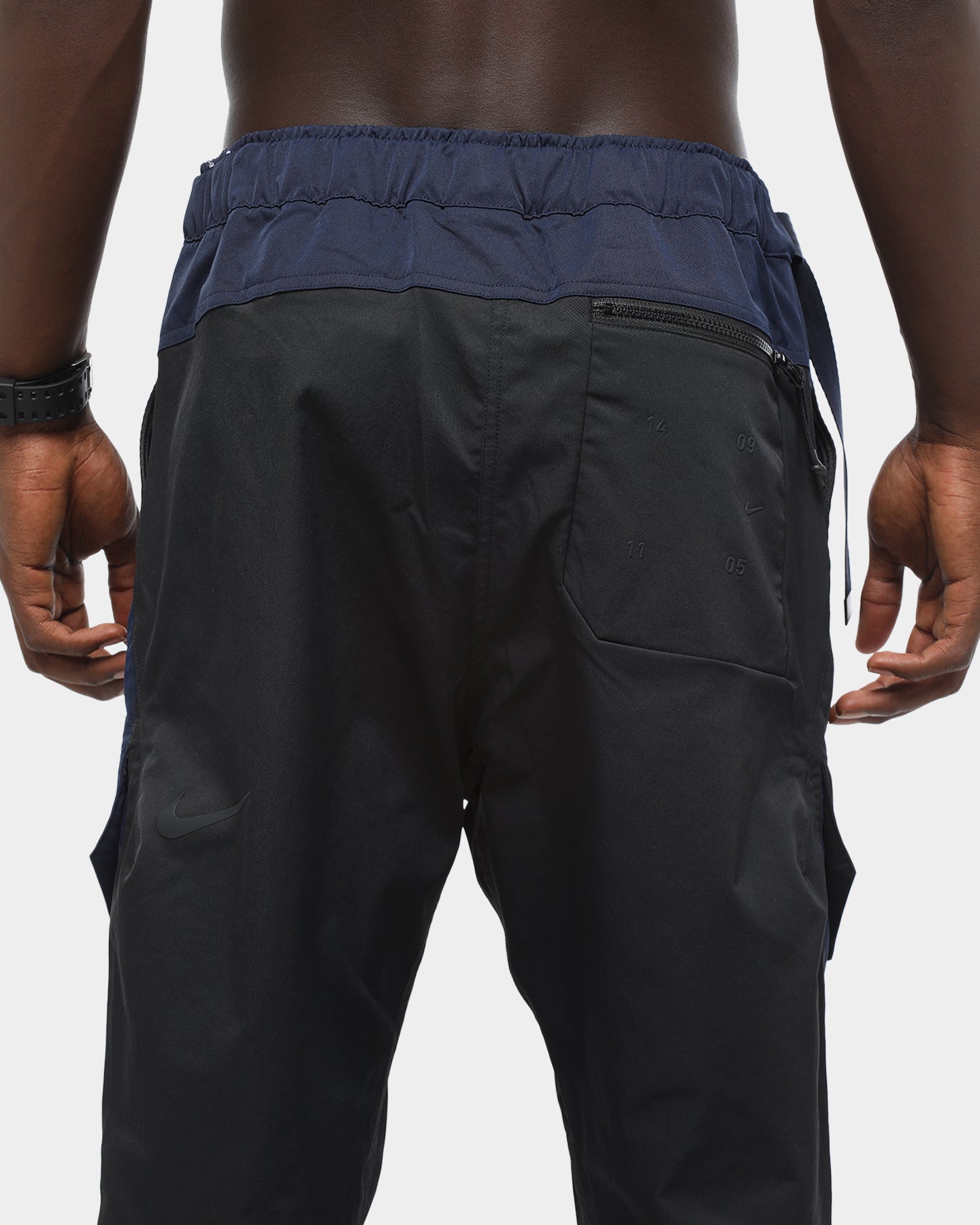 nike tech woven pants