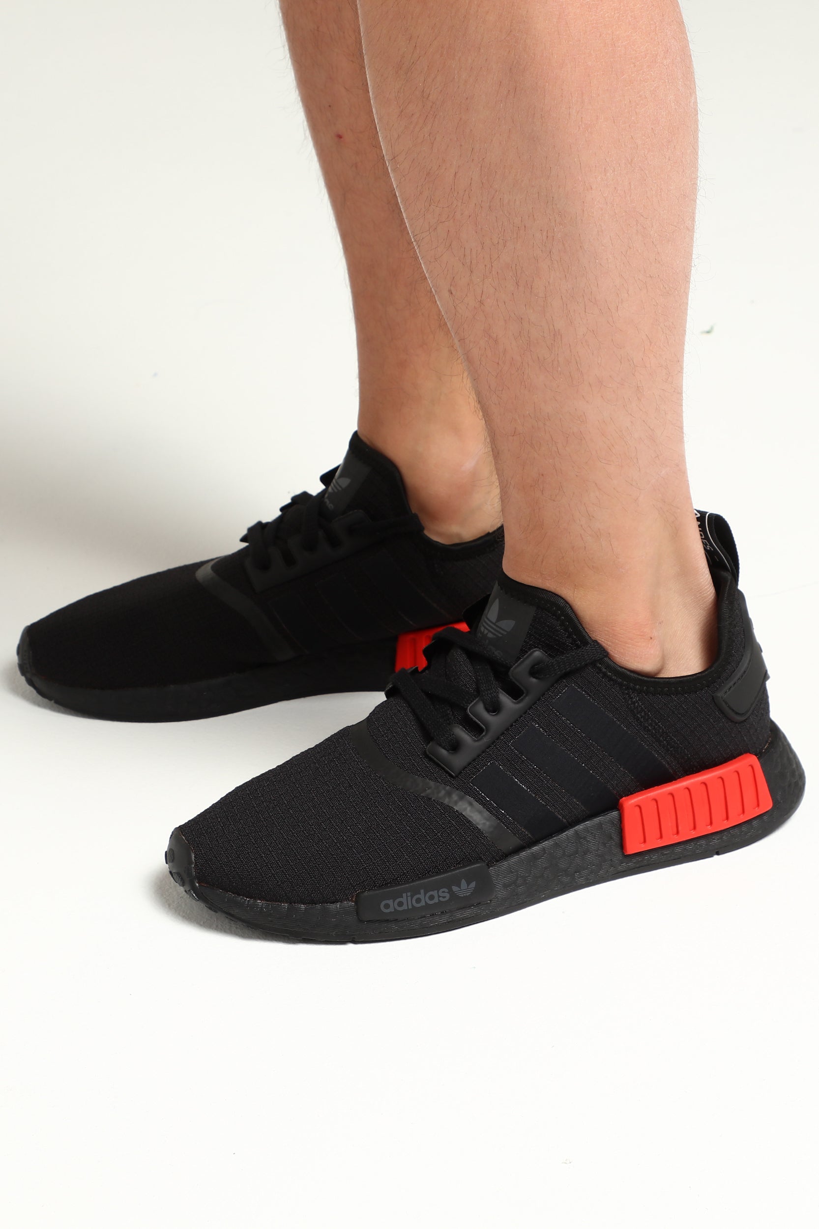 adidas nmd black and red