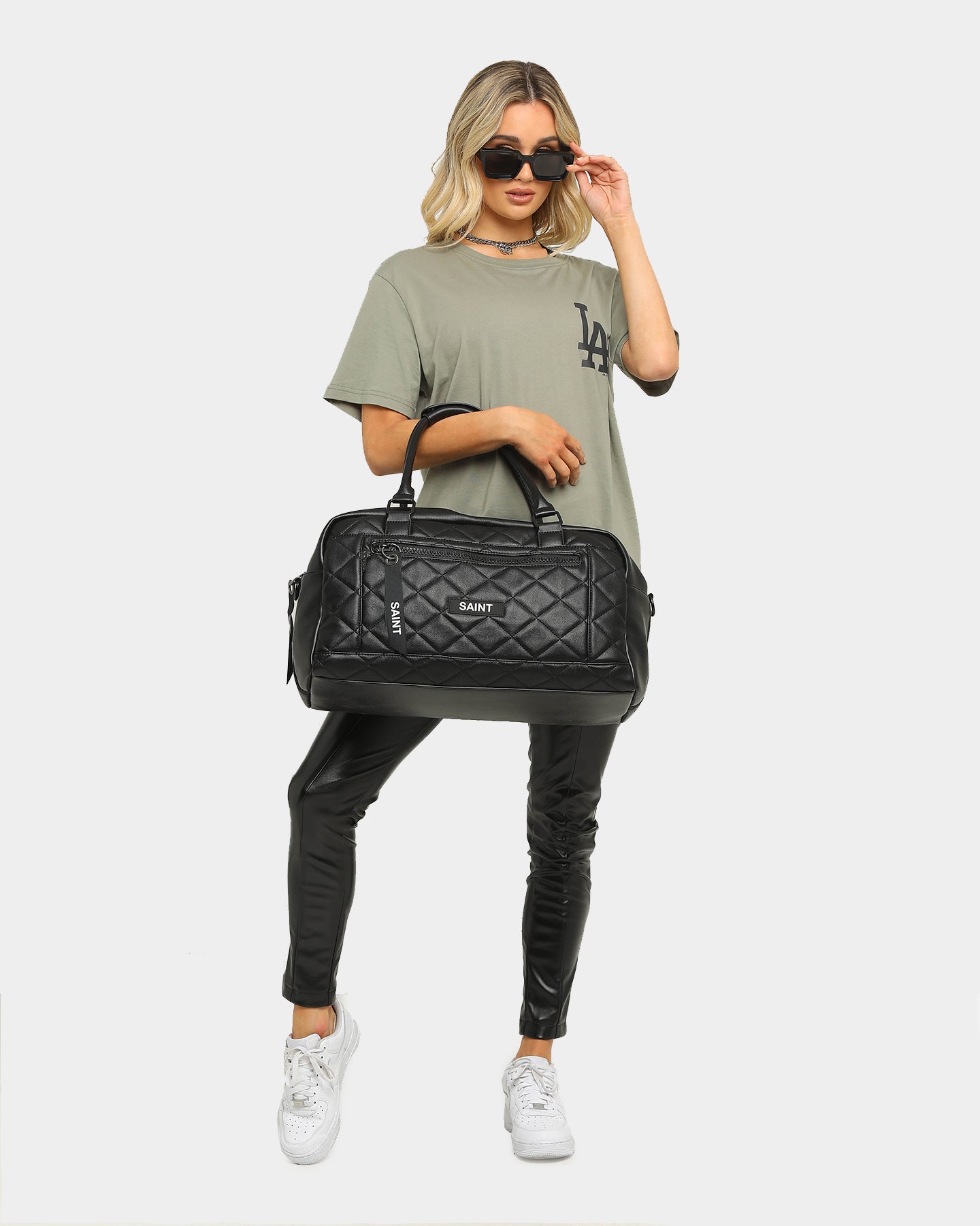 black quilted overnight bag