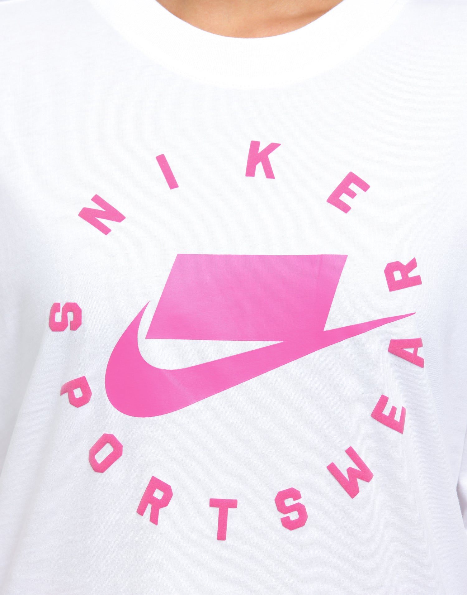 white nike shirt with pink logo