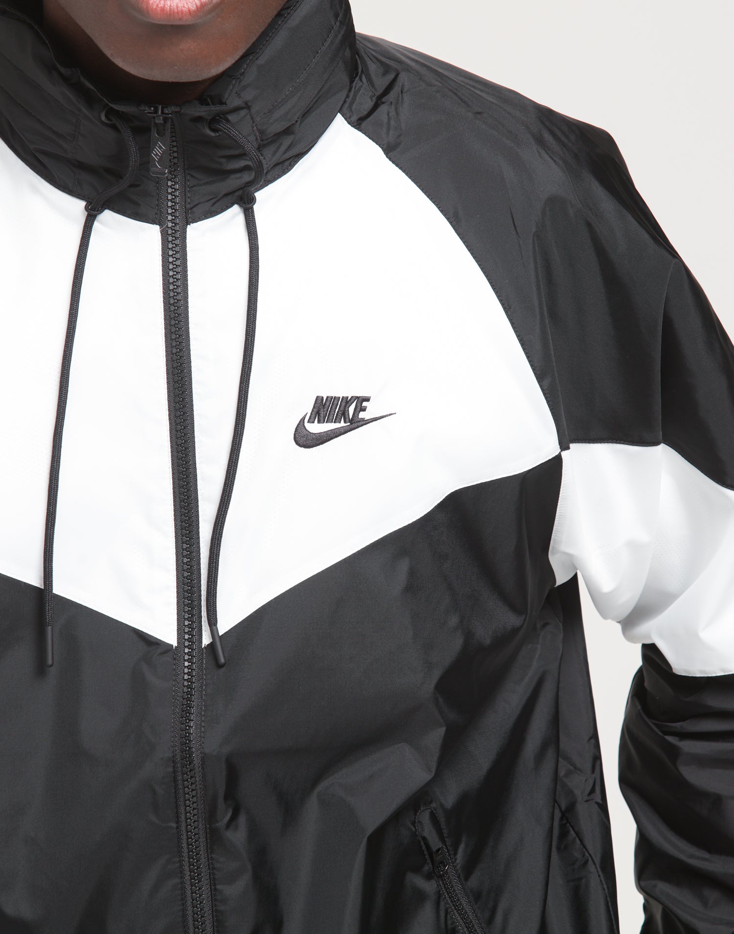 nike sportswear windrunner black and white