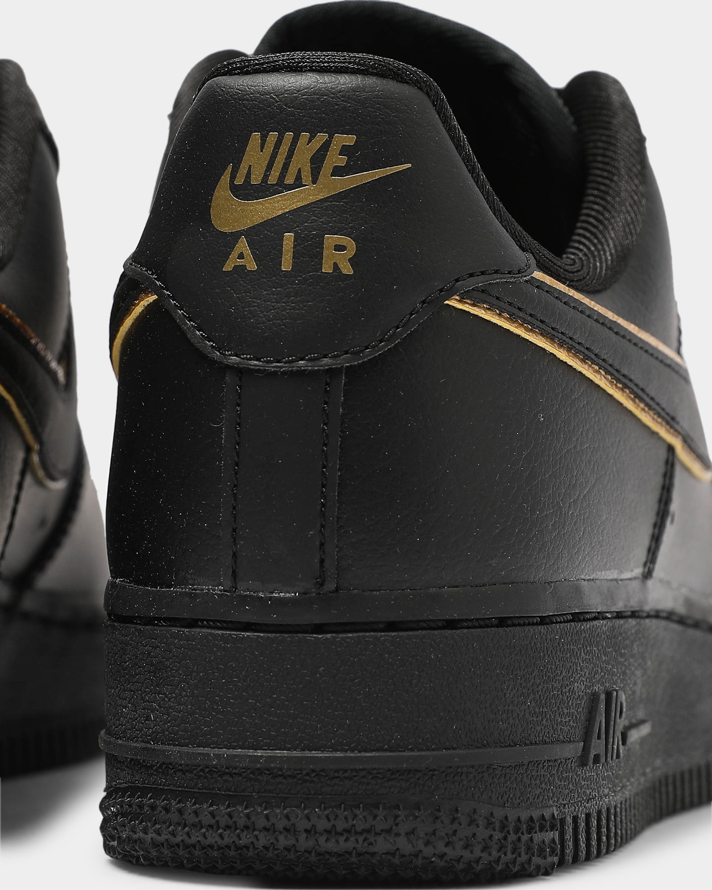 nike air force 1 womens black and gold