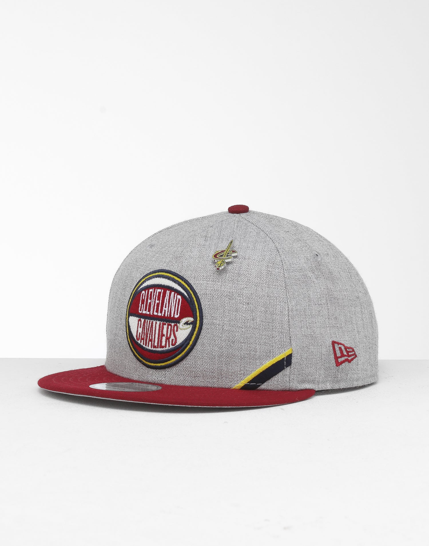 New Era Cleveland Cavaliers 9Fifty NBA Draft Snapback Maroon New Era Cleveland Browns Tactical Camo Band 9FIFTY Snapback