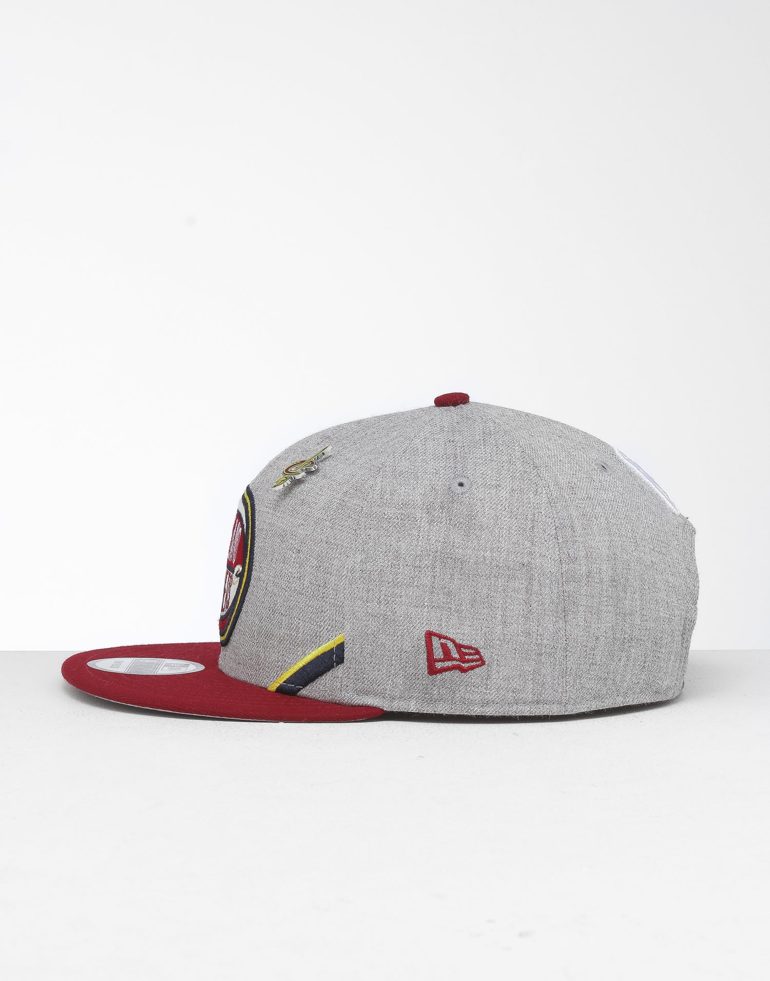New Era Cleveland Cavaliers 9Fifty NBA Draft Snapback Maroon New Era Cleveland Browns Tactical Camo Band 9FIFTY Snapback