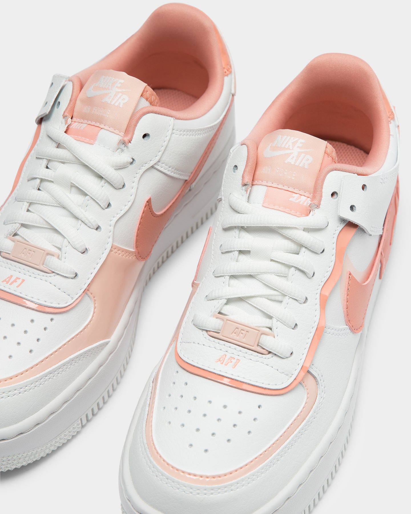 womens pink and white air force ones