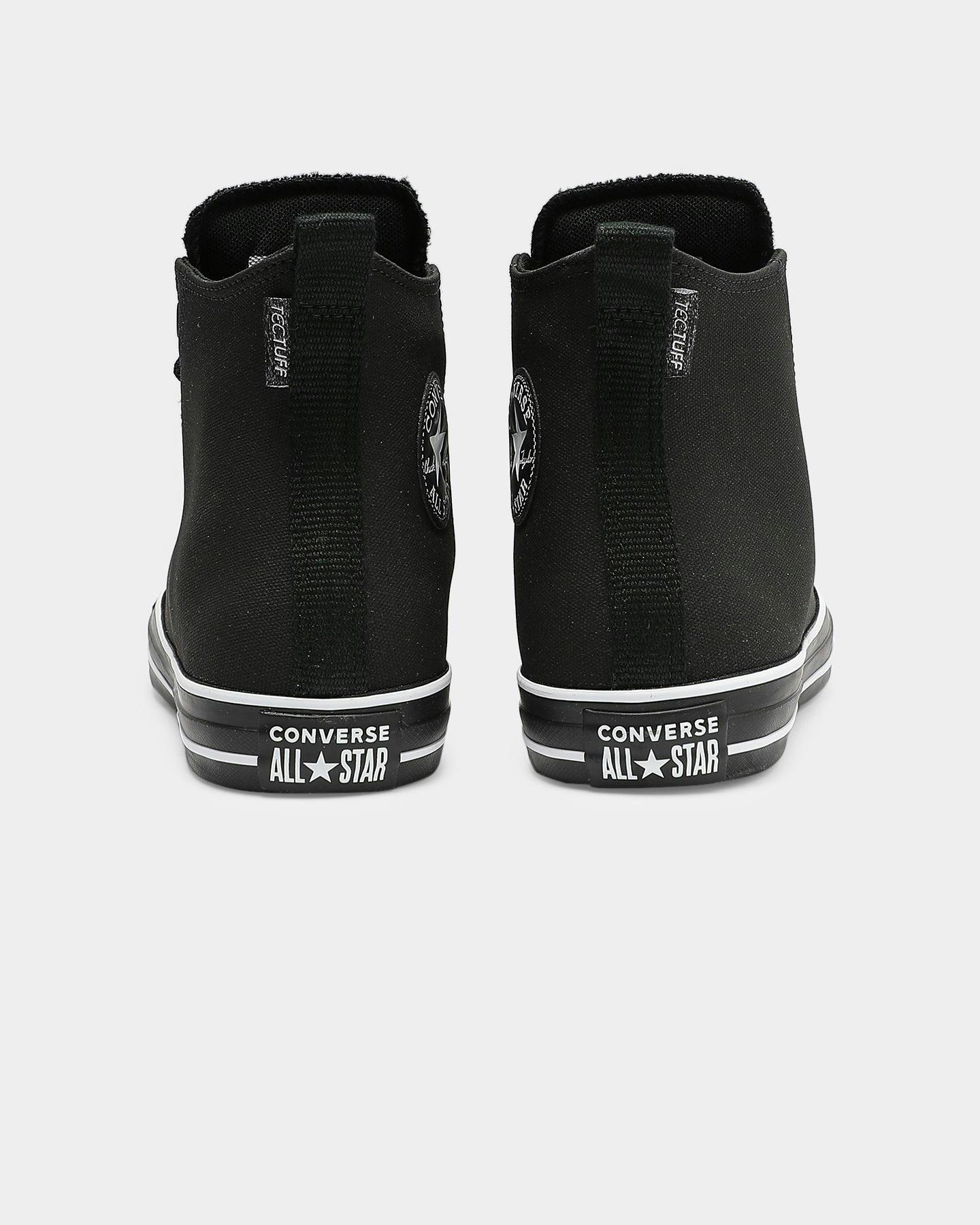 black converse with white tongue