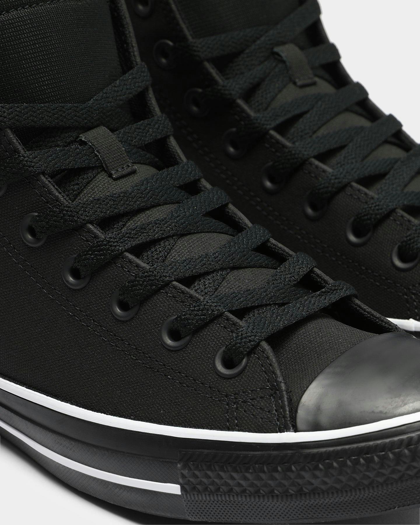 black converse with white tongue