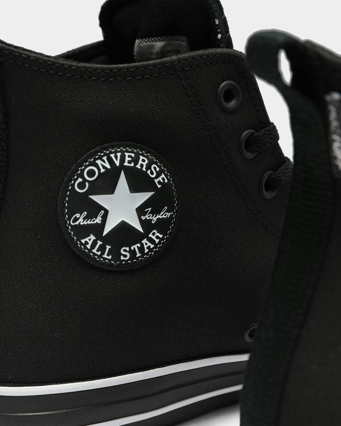 black converse with white tongue