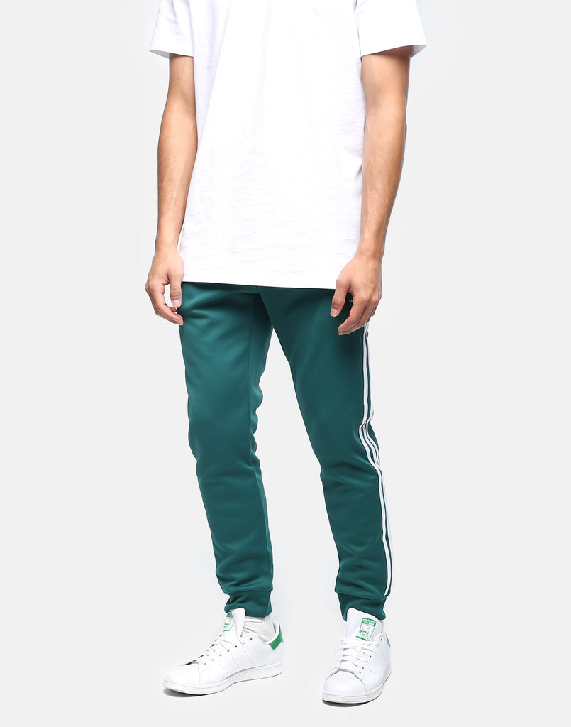 adidas sst track pants green