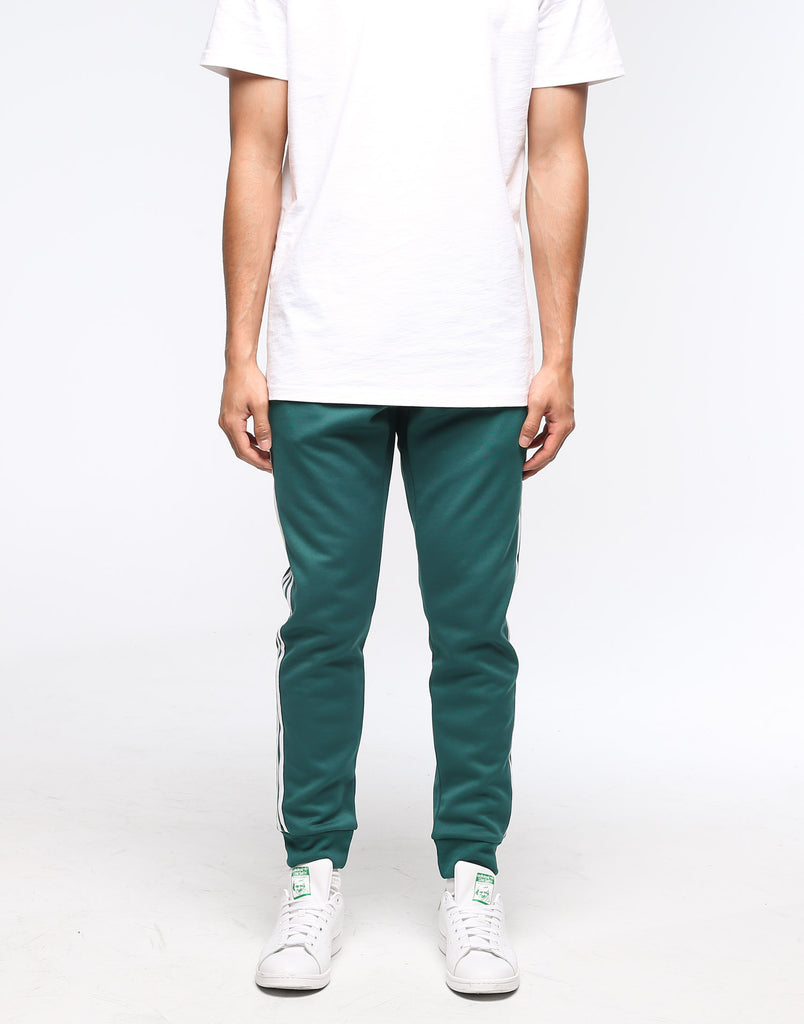 adidas sst track pants green