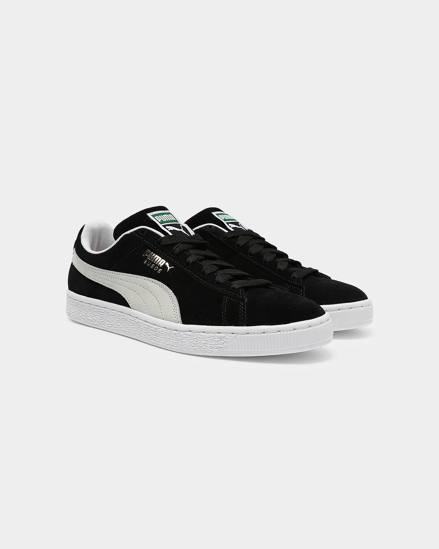 puma suede shoes black and white