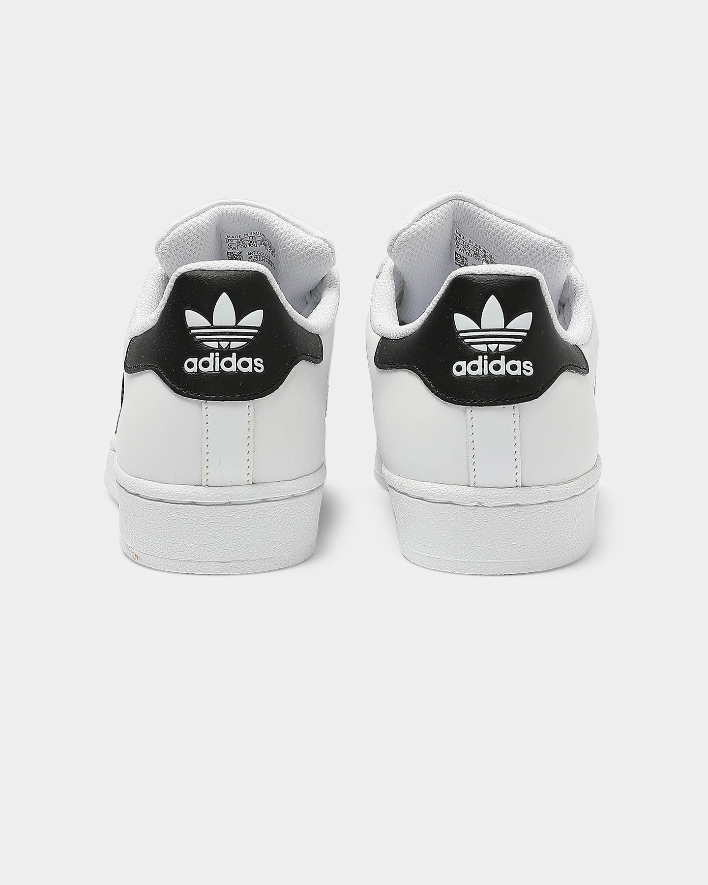 white and black adidas