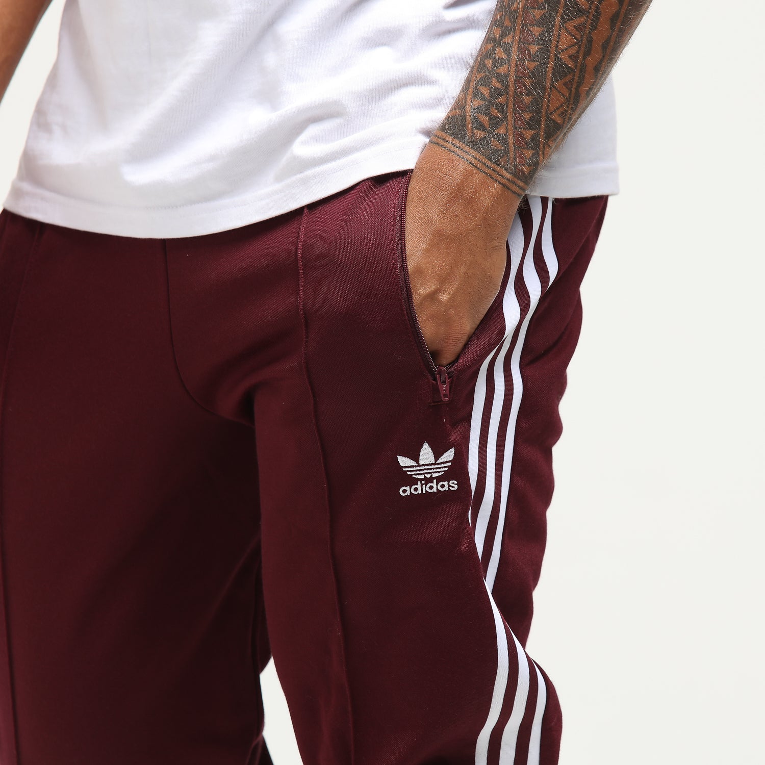 adidas beckenbauer track pants maroon