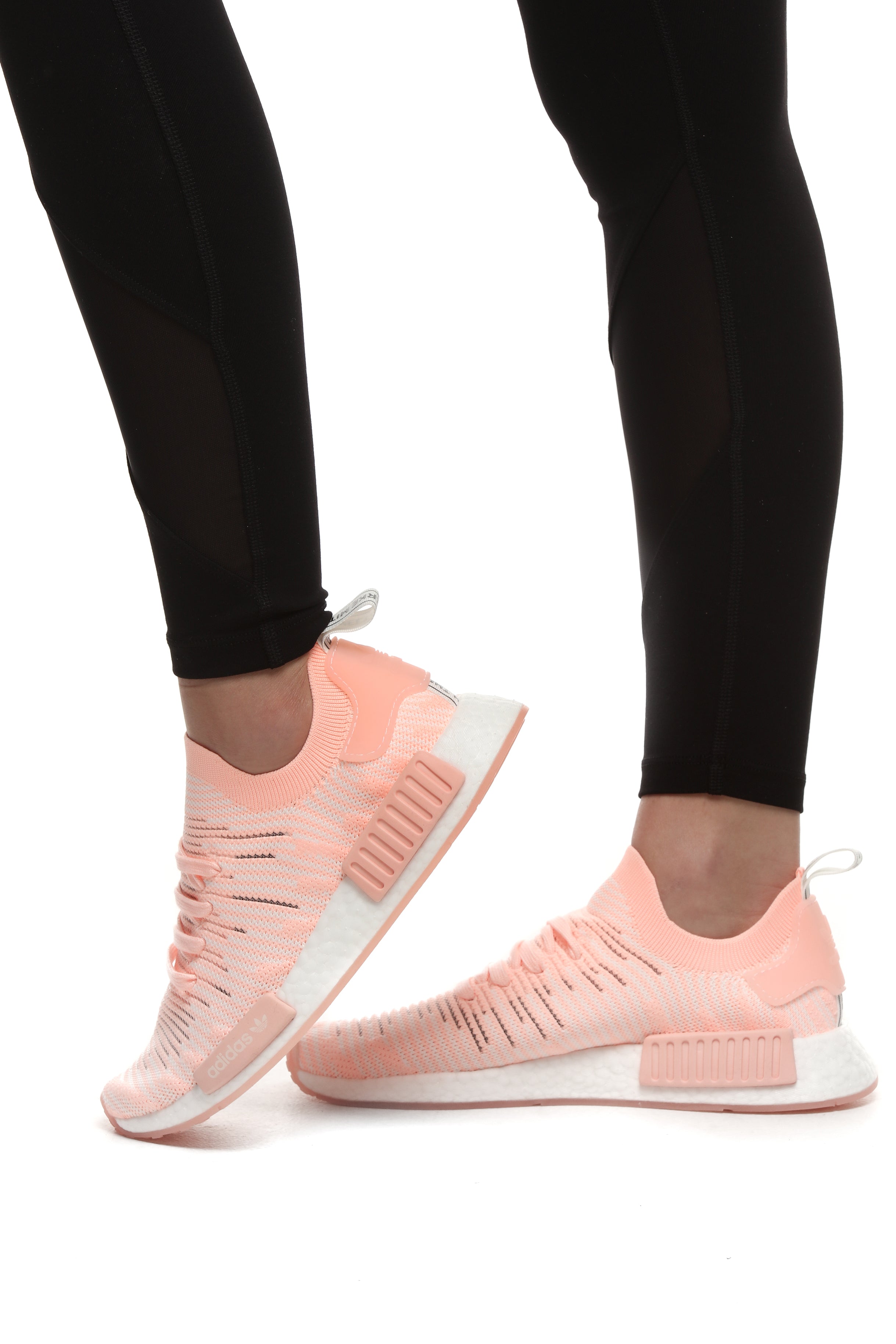 nmd_r1 stlt primeknit shoes clear orange