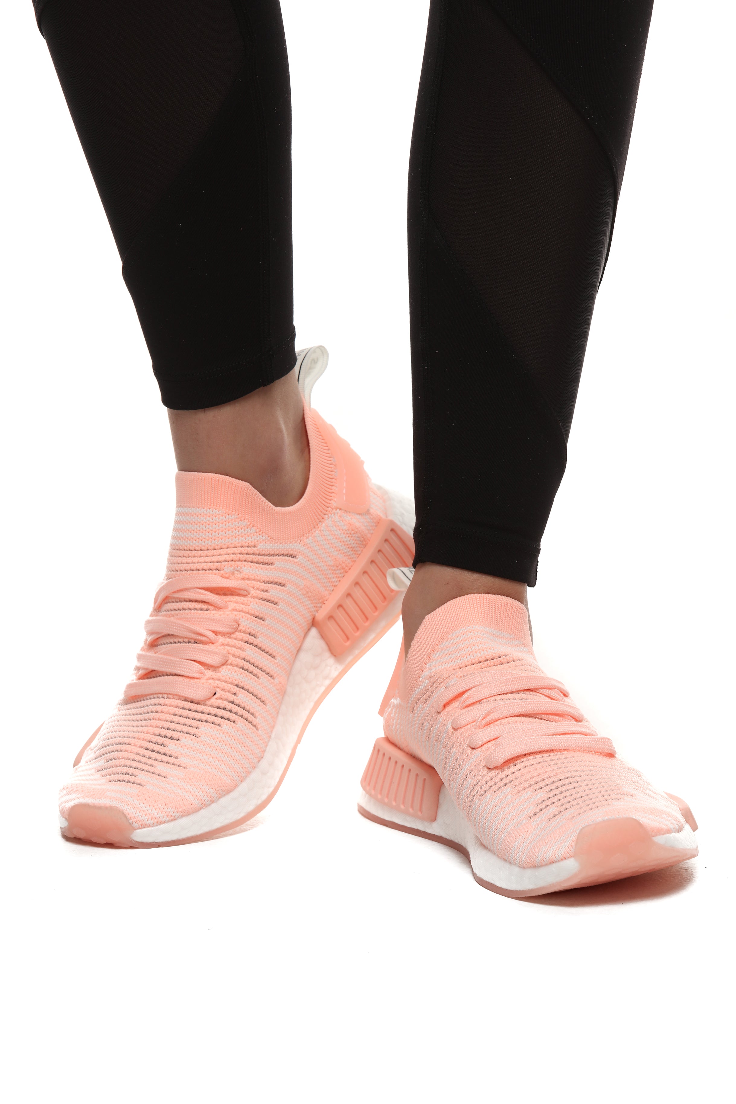 nmd_r1 stlt primeknit shoes clear orange