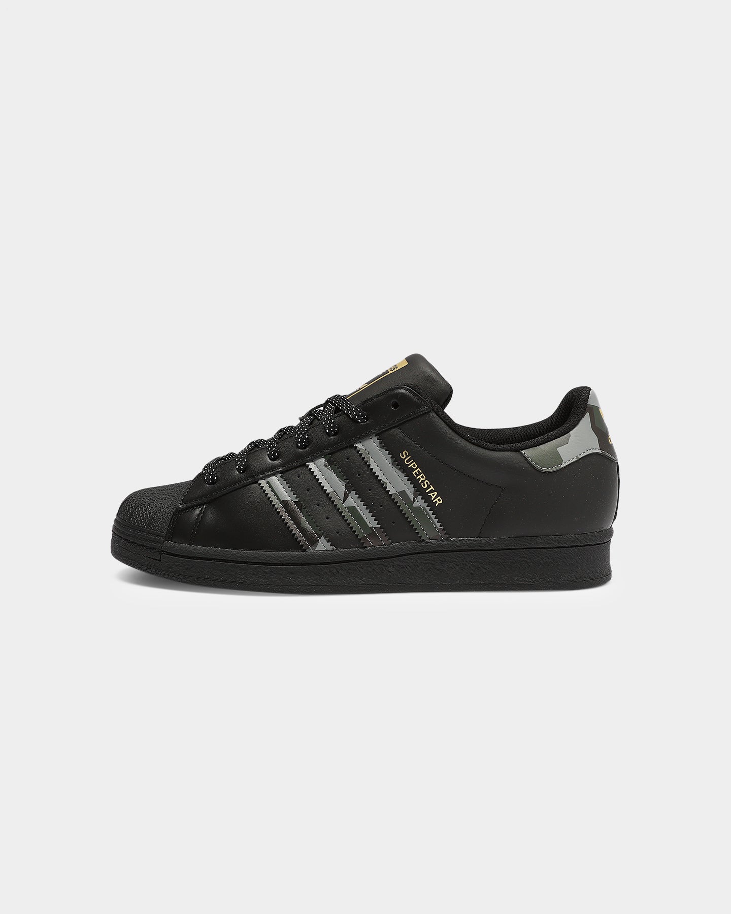 black and gold superstar adidas