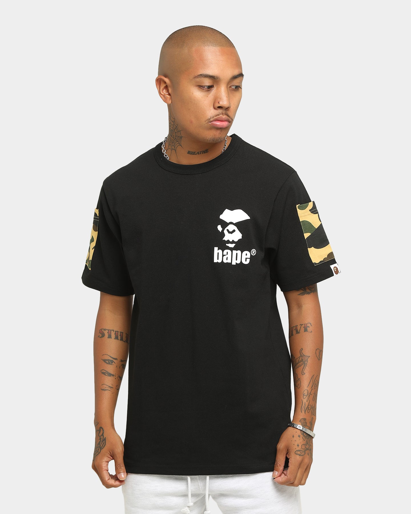 black and yellow bape shirt