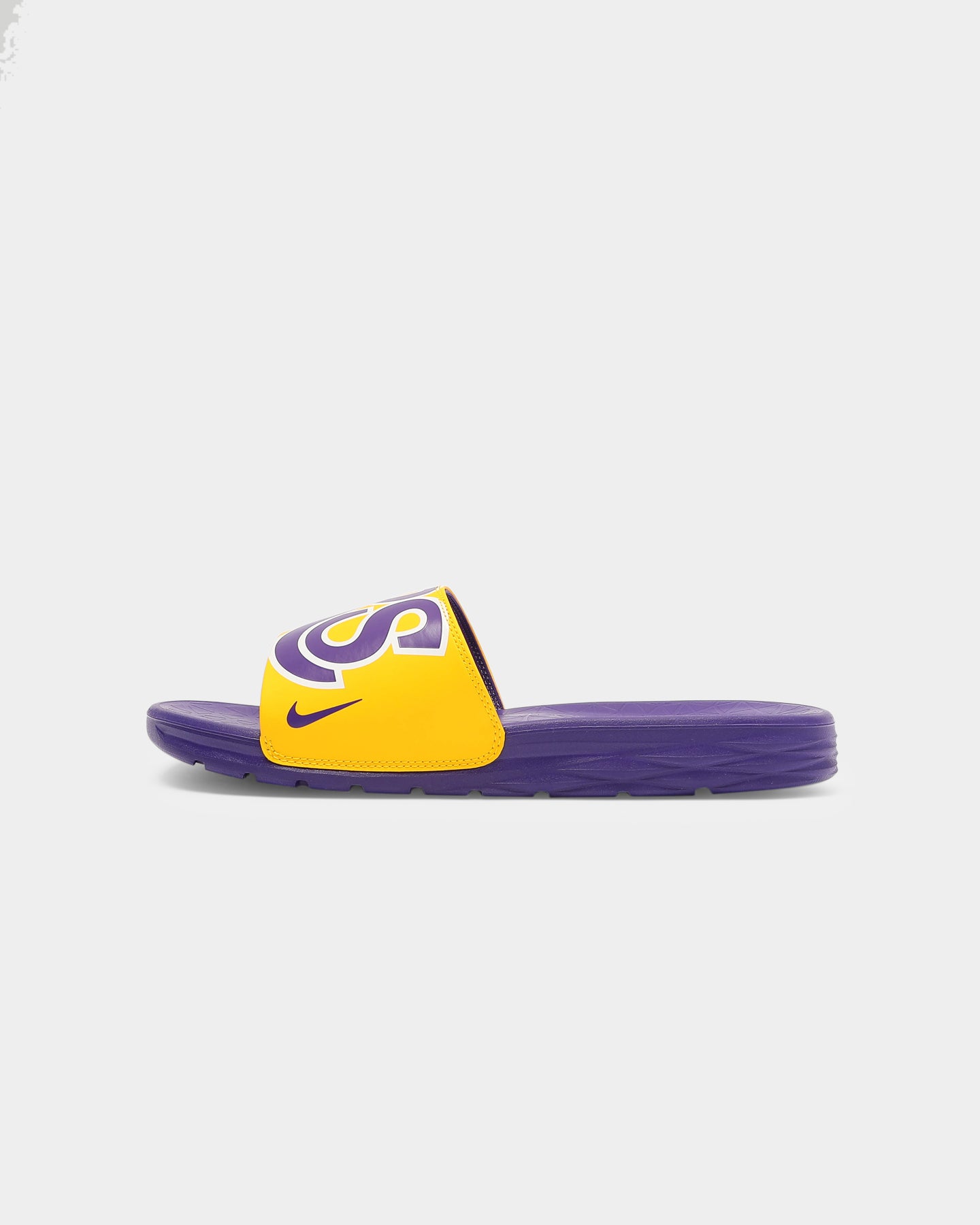 purple nike sandals with gold swoosh