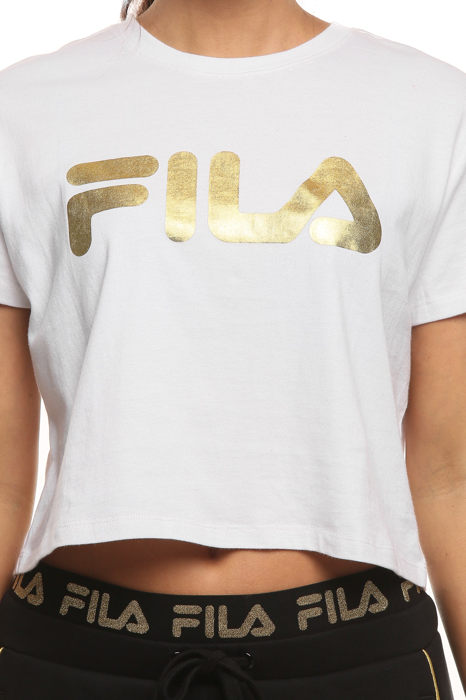 white and gold fila shirt