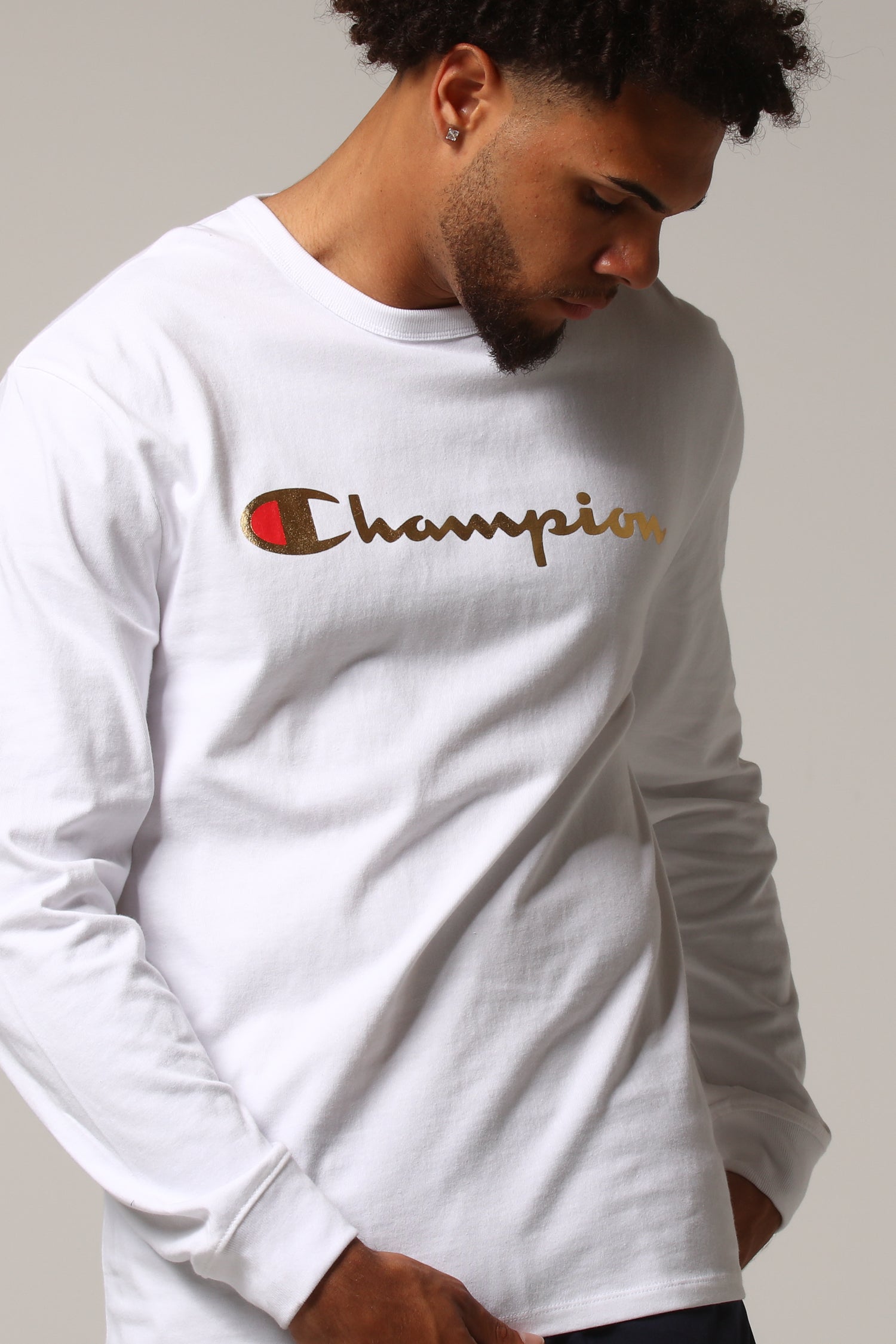 champion gold and white shirt